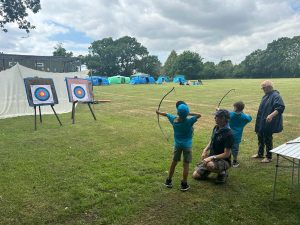 Beaver Scouts playing Archery